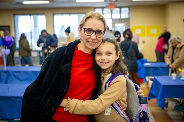 grandma and girl smiling